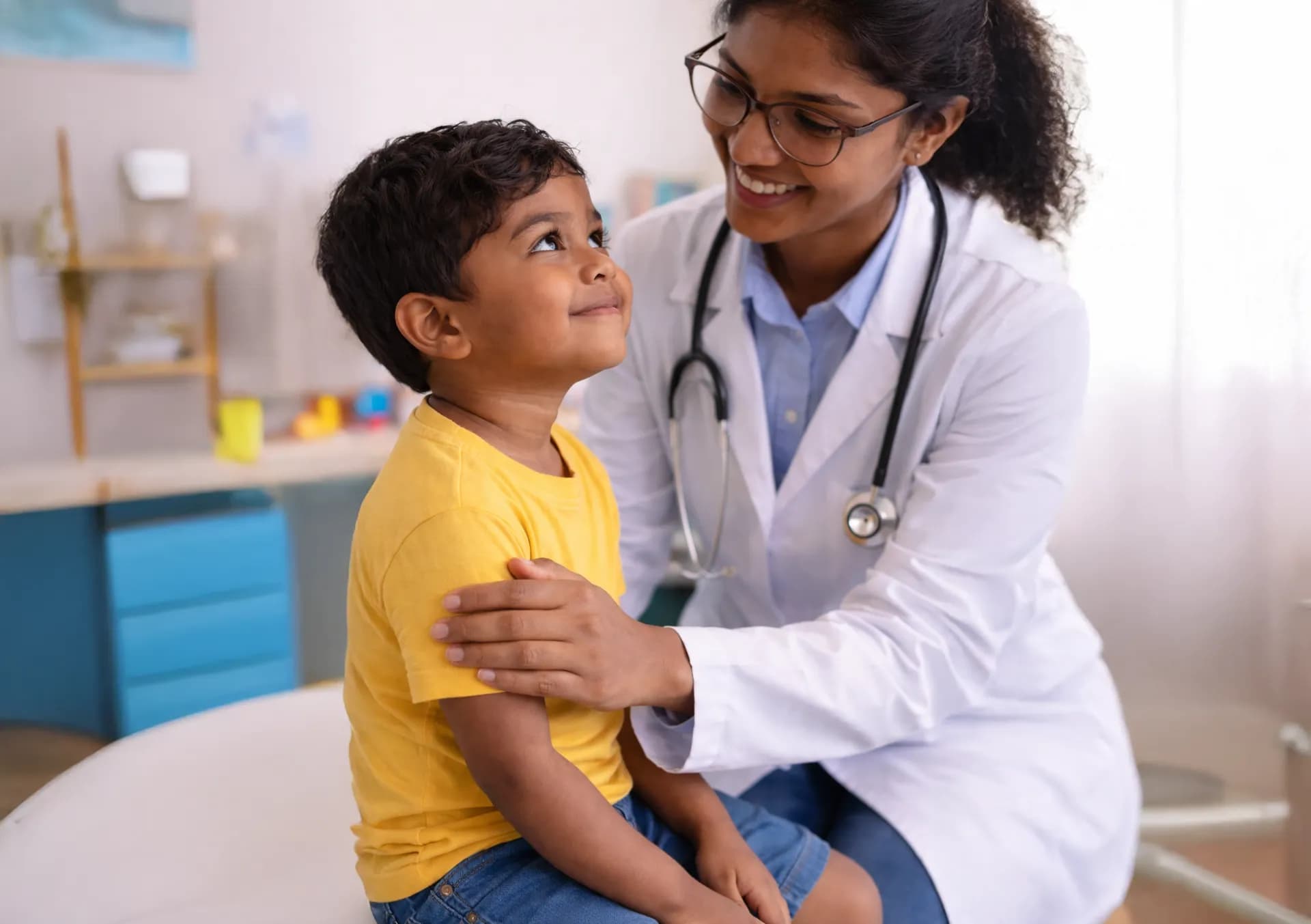 Doctor with child patient